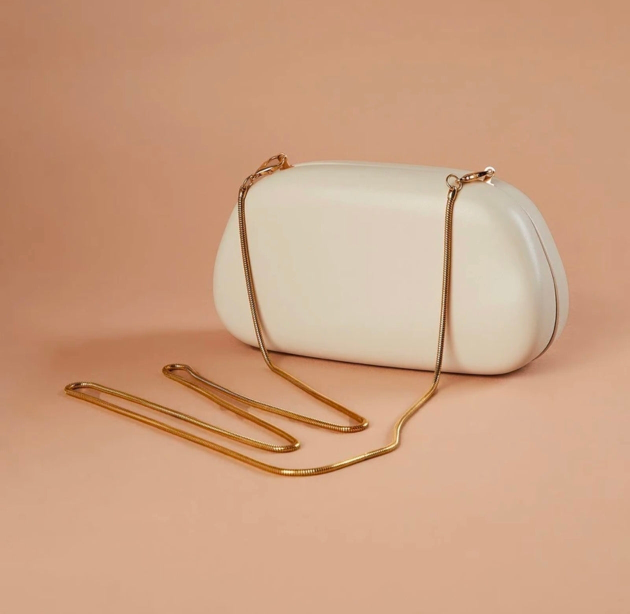 Kaiso Chic White Acrylic Clutch Bag with Gold-Tone Oversized 'C' Handle